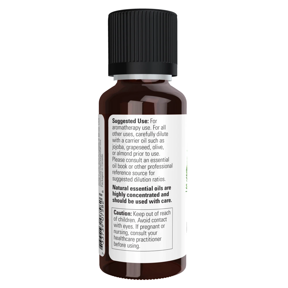 Bottle of essential oil with a black cap on a white background
